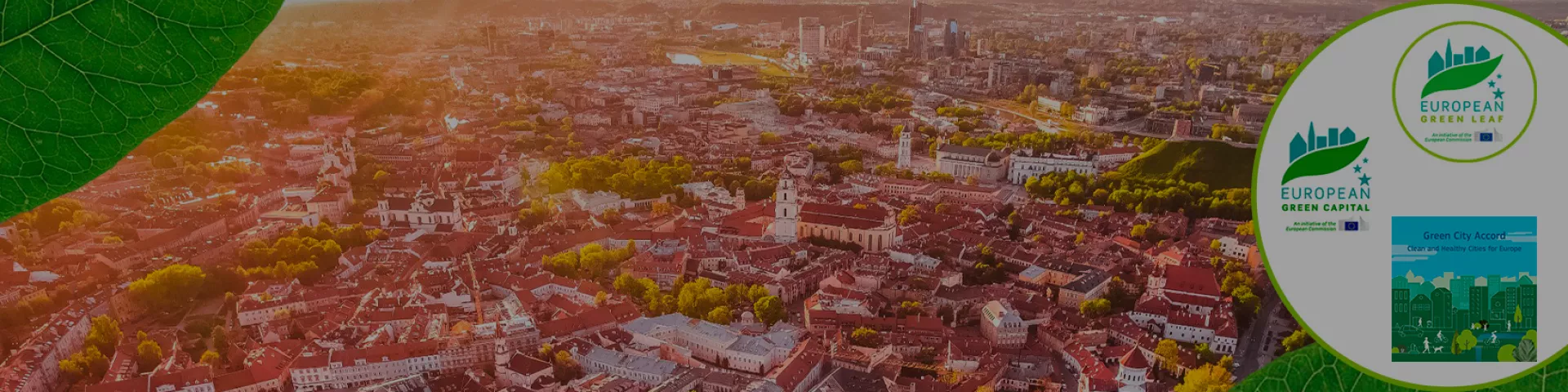 Aerial view of Vilnius branded with the logos of the Green Cities Accord and the EU Green Capital and Green Cities Awards